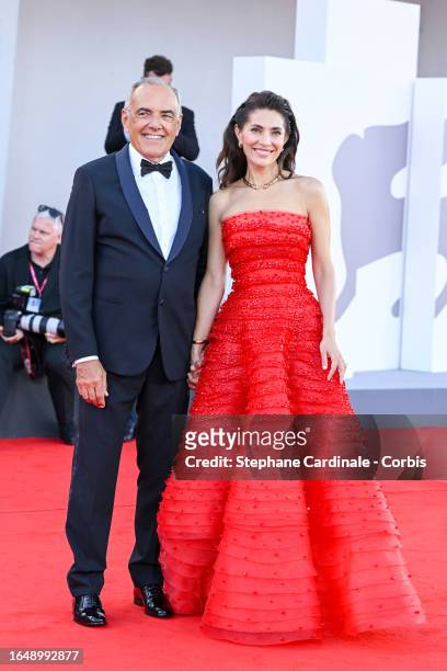 Director of the Festival Alberto Barbera and Patroness Caterina Murino attend the opening red carpet at the 80th Venice International Film Festival...