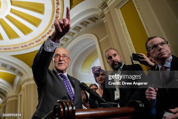 Senate Majority Leader Chuck Schumer speaks during a news conference following a closed-door lunch meeting with Senate Democrats at the U.S. Capitol...