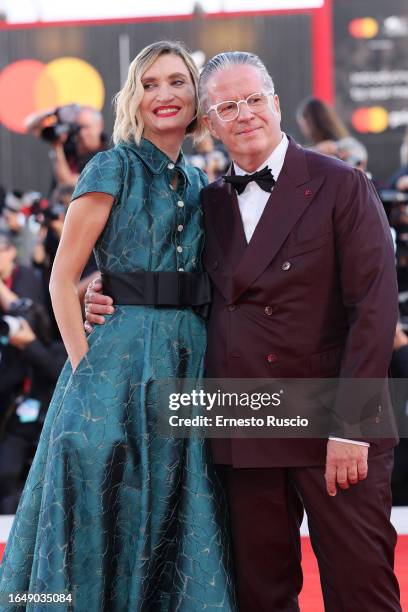 Alessandra Mion and Ernst Knam attend the opening red carpet at the 80th Venice International Film Festival on August 30, 2023 in Venice, Italy.