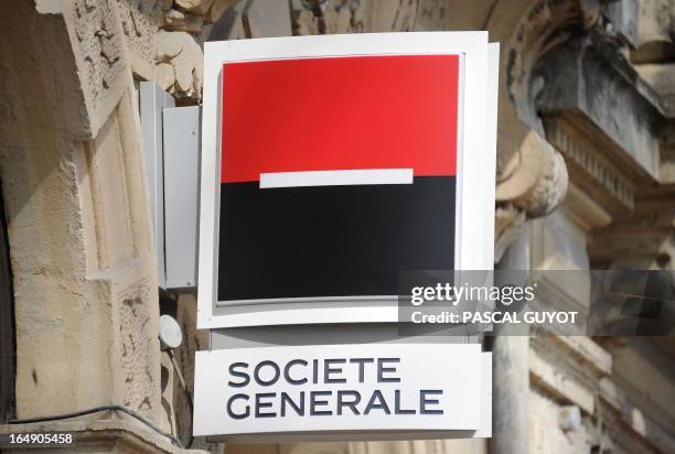 Photo taken on March 27, 2013 shows the logo of the French bank Societe Generale at a branch in the center of the southern French city of...