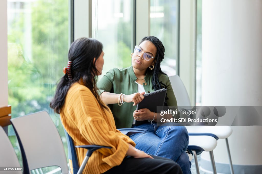 Vulnerable woman shares something with therapist during therapy session