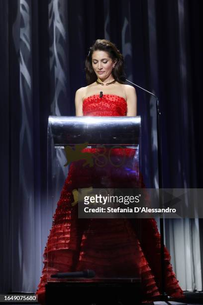 Patroness Caterina Murino speaks on stage at the opening ceremony at the 80th Venice International Film Festival on August 30, 2023 in Venice, Italy.