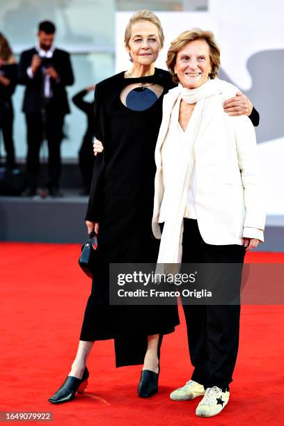 Charlotte Rampling and Director Liliana Cavani attend the opening red carpet at the 80th Venice International Film Festival on August 30, 2023 in...