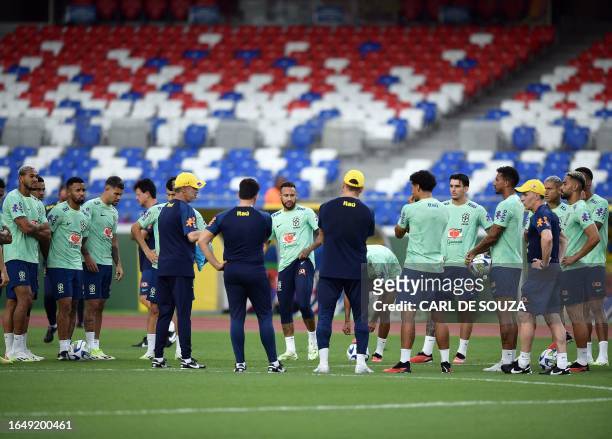 Brazil's forward Neymar and teammates take part in a training session at the Mangueirao stadium in Belem, Para State, Brazil, on September 6 ahead of...