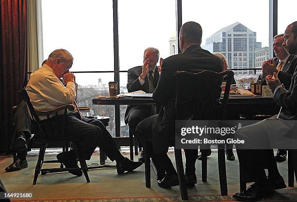 Mayor Thomas Menino lets his staff know that he will not seek re-election. From left to right are Menino, Peter Meade, head of the BRA, William...