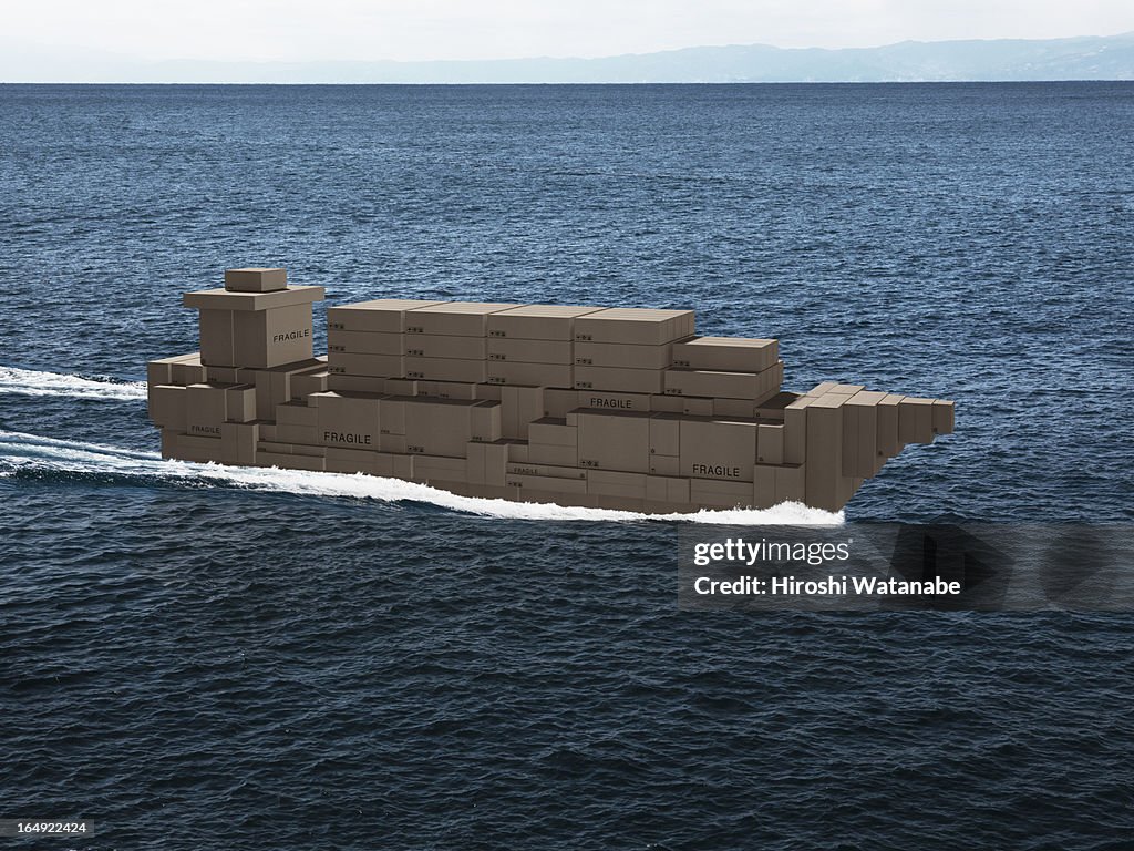 Container ship made out of cardboard boxes