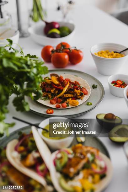 healthy feast with various mexican food - mexicaanse-gerechten stockfoto's en -beelden