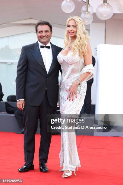 Gimmi Cangiano and Valeria Marini attend the opening red carpet at the 80th Venice International Film Festival on August 30, 2023 in Venice, Italy.