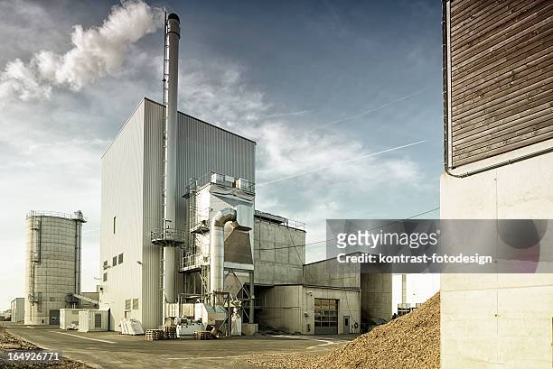 biomass plans, fernwaerme, combined heat and power plant, energy transition, germany - biomass power plant stock pictures, royalty-free photos & images