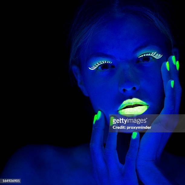 women portrait with lime green fingernails in neon light - art modeling studios stock pictures, royalty-free photos & images