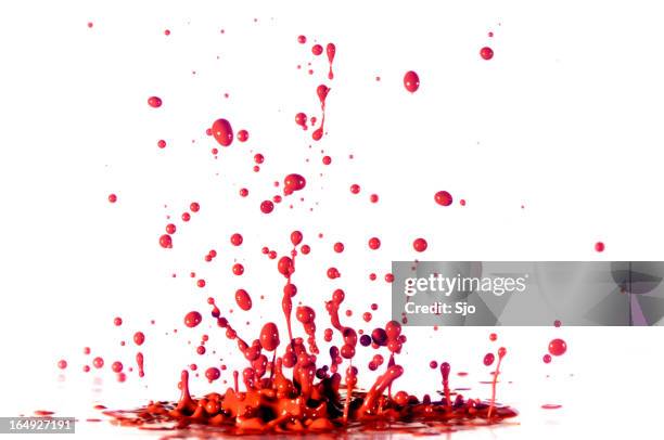 red paint - red paint splash stock pictures, royalty-free photos & images