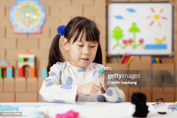 young girl was making craft at home - only japanese stock pictures, royalty-free photos & images