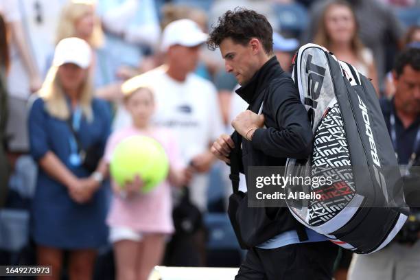 Dominic Thiem of Austria leaves the court after retiring against Ben Shelton of the United States during their Men's Singles Second Round match on...