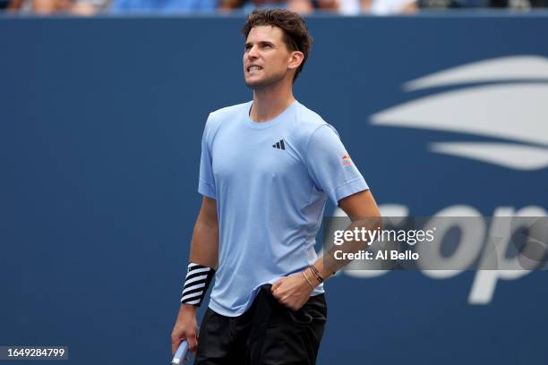 Dominic Thiem of Austria reacts against Ben Shelton of the United States during their Men's Singles Second Round match on Day Three of the 2023 US...