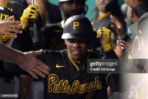 Ke'Bryan Hayes of the Pittsburgh Pirates celebrates his two-run home run with teammates in the eighth inning against the Kansas City Royals at...