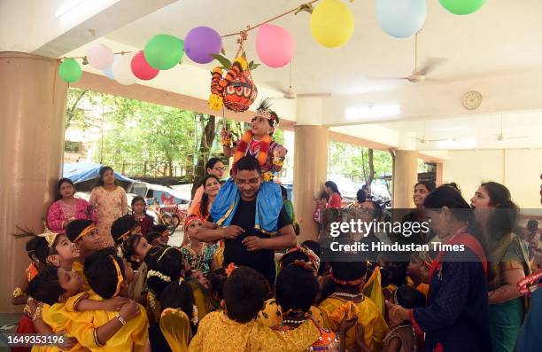 Dahihandi festival was celebrated with great enthusiasm at Shree Mawli Mandal School in Thane where the cowherds were dressed as Krishna and Radha on...