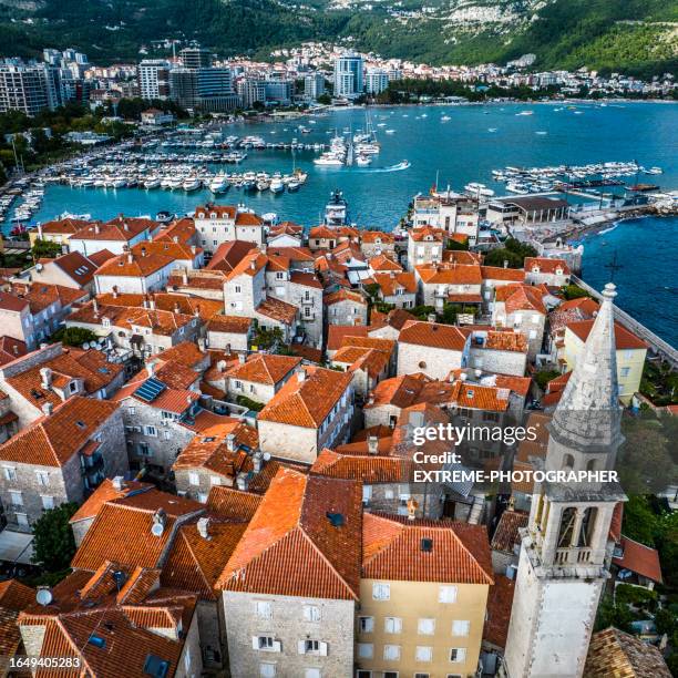 budva old town looking magnificent from this aerial view and captured with a drone - town square stockfoto's en -beelden