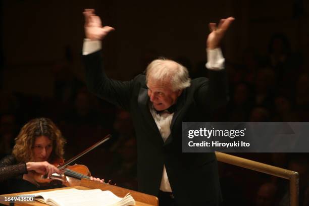 Leonard Slatkin conducting the National Symphony Orchestra at Carnegie Hall on Friday night, April 7, 2006.This image;Leonard Slatkin conducting the...