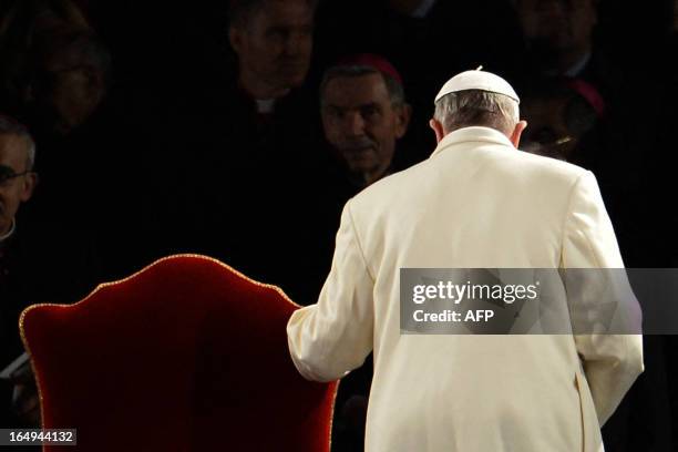 Pope Francis leaves after the Way of the Cross on Good Friday on March 29, 2013 at the Colosseum in Rome. Pope Francis presided over his first Good...