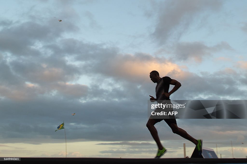 ATHLETICS-BRAZIL-JAMAICA-BOLT-BEACH