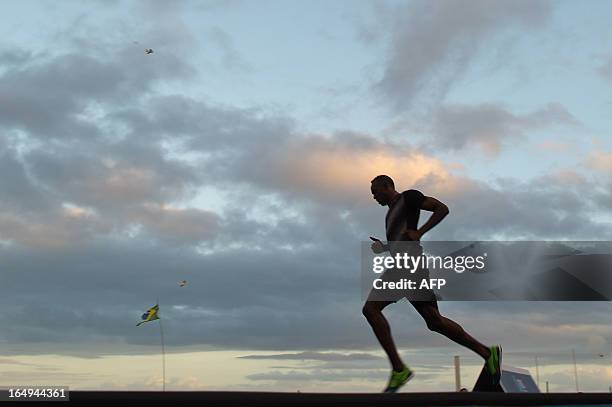ATHLETICS-BRAZIL-JAMAICA-BOLT-BEACH, News Photo