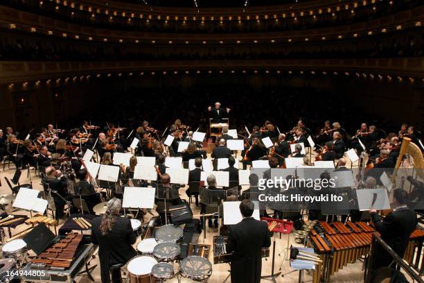 Leonard Slatkin conducting the National Symphony Orchestra at Carnegie Hall on Friday night, April 7, 2006.This image;Leonard Slatkin conducting the...