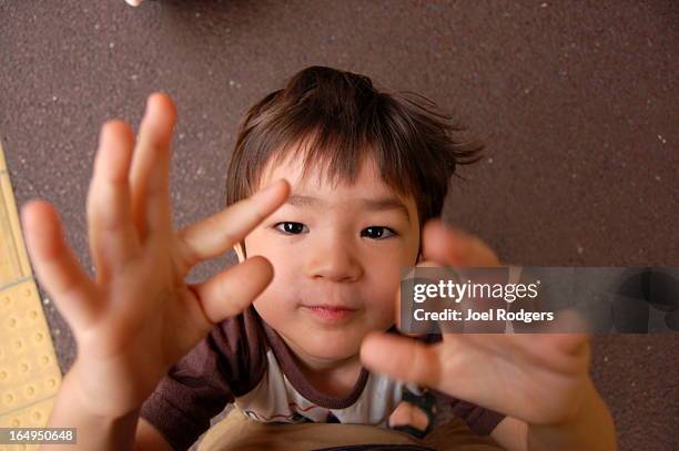 Kid Rizzing Up Camera Kid Reaching To Camera Photos and Premium High Res Pictures - Getty Images