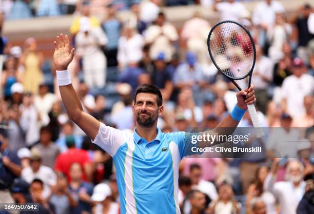 Novak Djokovic of Serbia celebrates to the crowd after his straight sets victor against Bernabe Zapata Miralles of Spain during their Men's Singles...