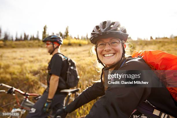 friends on a bike ride in the backcountry. - helmet ストックフォトと画像