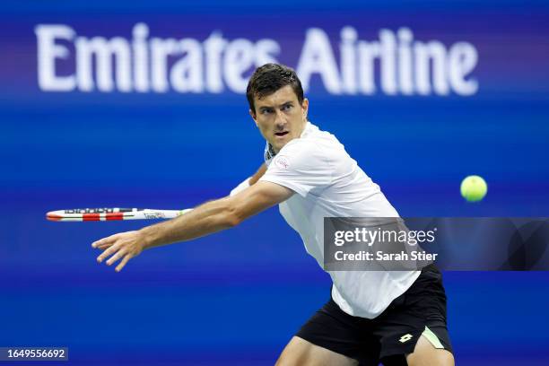 Sebastian Ofner of Austria returns a shot against Frances Tiafoe of the United States during their Men's Singles Second Round match on Day Three of...