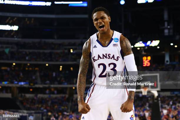 Ben McLemore of the Kansas Jayhawks reacts in the second half against the Kansas Jayhawks during the South Regional Semifinal round of the 2013 NCAA...
