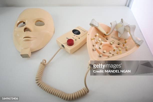The Rejuvenique facial mask is seen during a preview at the Museum of Failure in Washington, DC on September 6, 2023. The device applied electric...