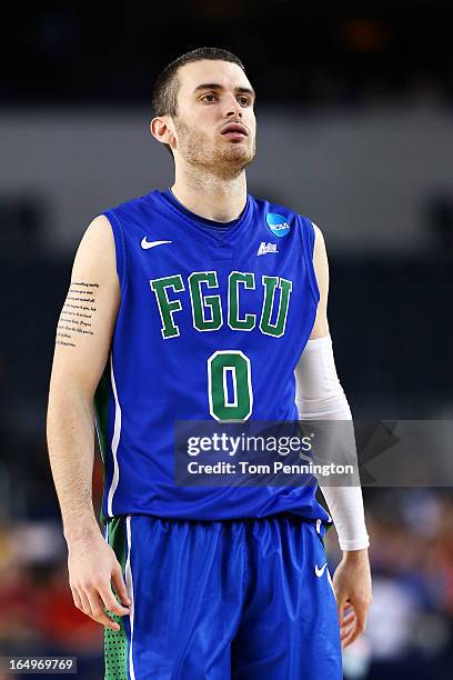 Brett Comer of the Florida Gulf Coast Eagles reacts in the second half against the Florida Gators during the South Regional Semifinal round of the...