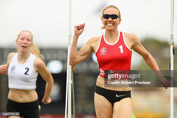 Tamsyn Manou of Glen Iris celebrates after winning Heat 10 State of Victoria Strickland Family Women's Gift during the 2013 Stawell Gift carnival at...