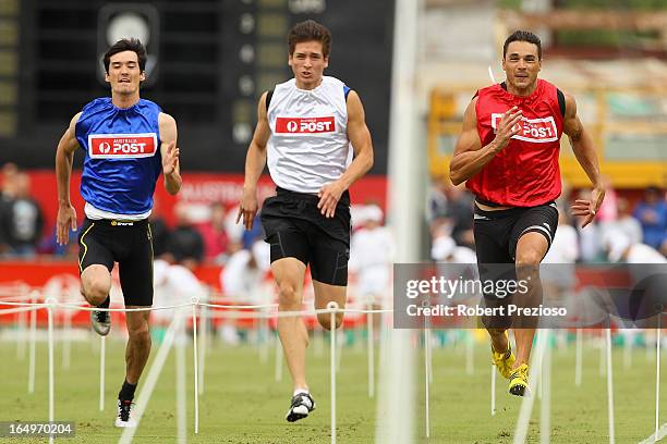 Joshua Ross of Hawthorn East competes in the Australia Post Stawell Gift Heat 12 during the 2013 Stawell Gift carnival at Central Park on March 30,...