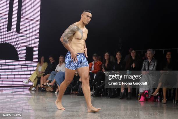 Model walks the runway during the Jockey show during New Zealand Fashion Week 23: Kahuria at Viaduct Events Centre‎ on August 31, 2023 in Auckland,...