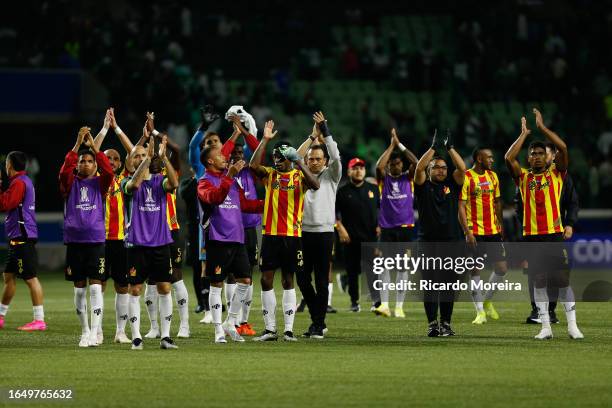 Players of Deportivo Pereira greet fans after elimination during a second leg quarter final match between Palmeiras and Deportivo Pereira as part of...