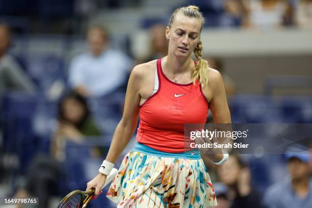 Petra Kvitova of Czech Republic reacts after a point against Caroline Wozniacki of Denmark during their Women's Singles Second Round match on Day...