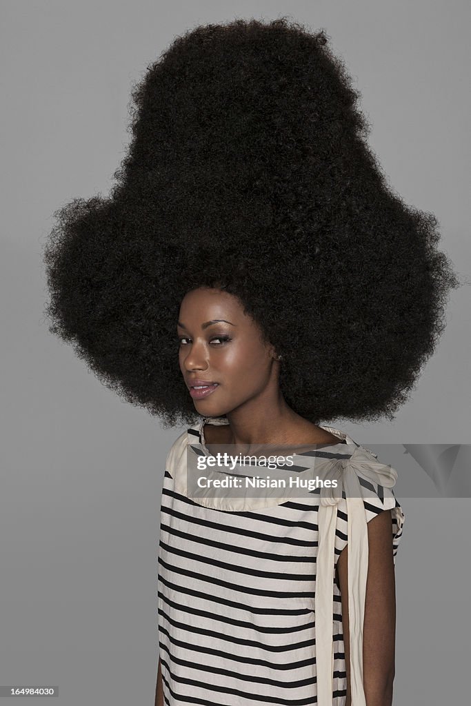 Portrait of woman with very large afro