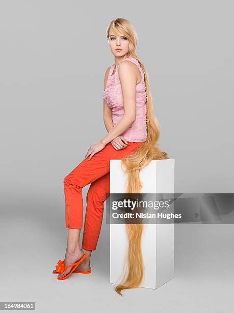 young woman with very long hair - surplus stock pictures, royalty-free photos & images