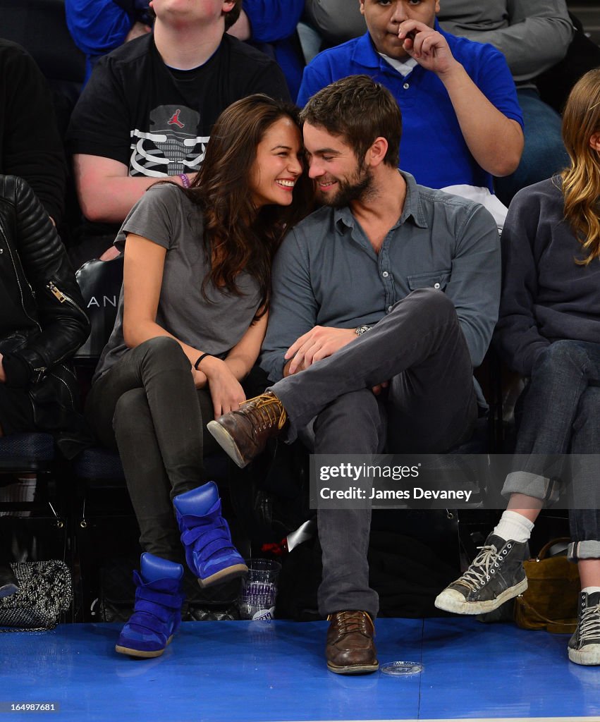 Celebrities Attend The Charlotte Bobcats Vs New York Knicks Game