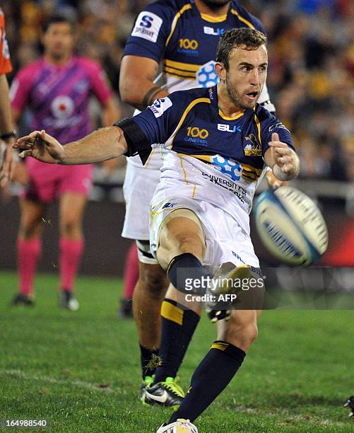 Nic White of the Brumbies kicks the ball against the Bulls during round 7 of the rugby Super 15 match in Canberra on March 30, 2013. The Brumbies won...