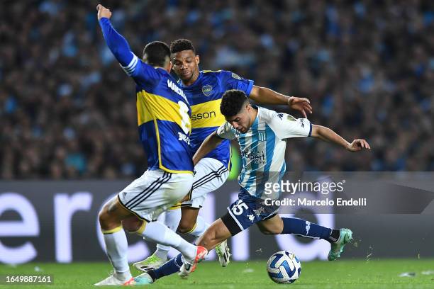 Maxi Romero of Racing fights for the ball with Marcos Rojo and Frank Fabra of Boca Juniors during a second leg quarter final match between Racing...
