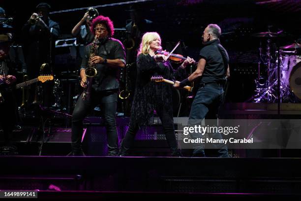 Jake Clemons, Soozie Tyrell and Bruce Springsteen of the E Street Band perform at MetLife Stadium on August 30, 2023 in East Rutherford, New Jersey.