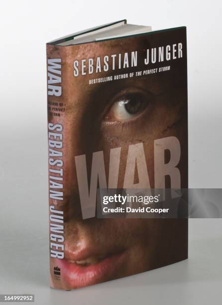 May 27 2010- bk-books30 - War by Sebastian Junger; Innocent by Scott Turow; Hitch-22 by Christopher Hitchens; The Ghost Brush by Katherine Govier;...