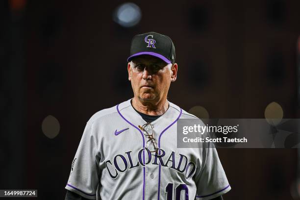 Manager Bud Black of the Colorado Rockies looks on against the Baltimore Orioles during the sixth inning at Oriole Park at Camden Yards on August 25,...