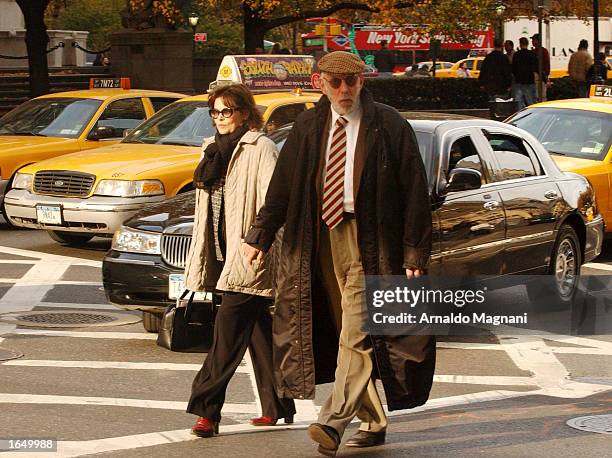 Actor Donald Sutherland walks with his wife, actress Francine Racette, along Fifth Avenue November 15, 2002 in New York City.