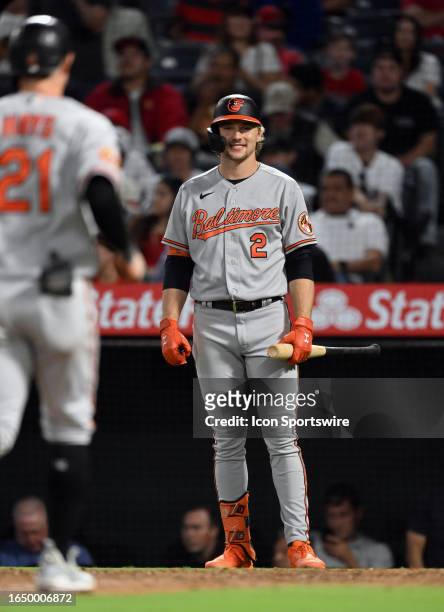 Baltimore Orioles third baseman Gunnar Henderson waits at home for left fielder Austin Hays after Hays hit a solo home run in the eighth inning of an...