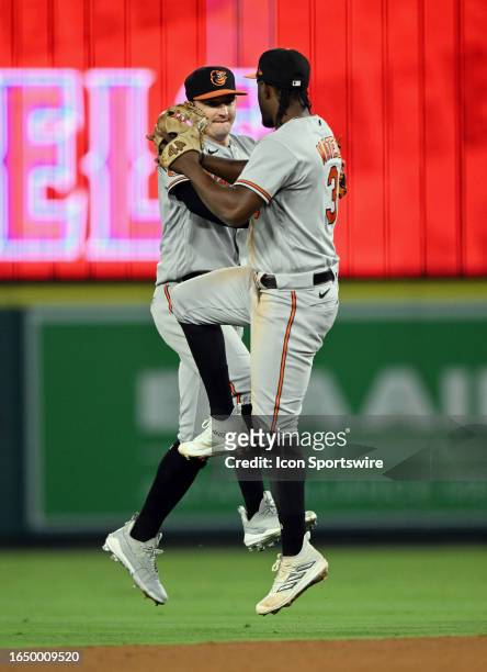 Baltimore Orioles outfielder Austin Hays and infielder Jorge Mateo celebrate on the field after the Orioles defeated the Los Angeles Angels 10 to 3...