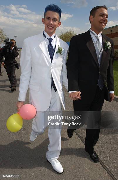 Marc Hall and his date Jean-Paul Dumont on their way to the Monsignor John Pereyma Catholic Secondary School prom. They stopped to talk to the press...